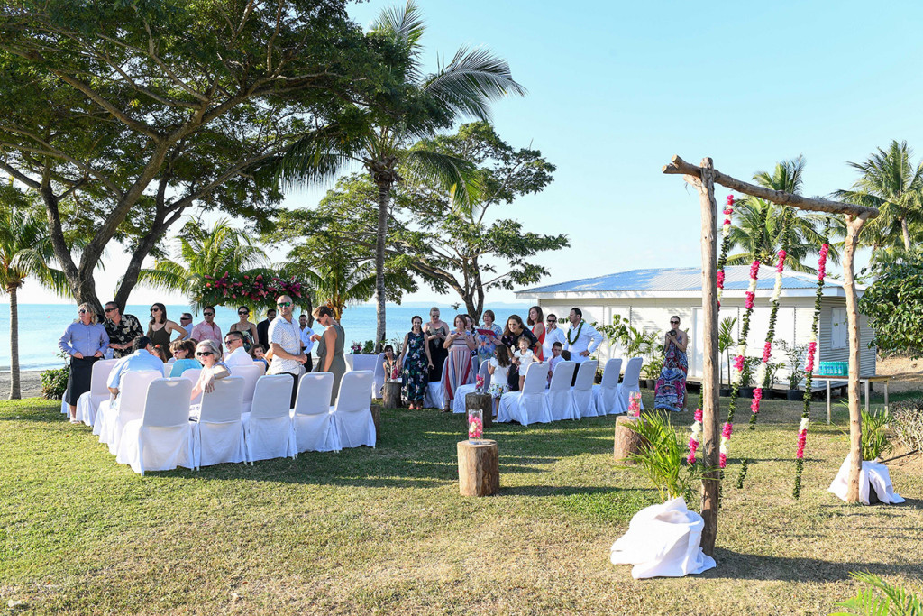 Wedding guests at the Sofitel Fiji beach wedding ceremony