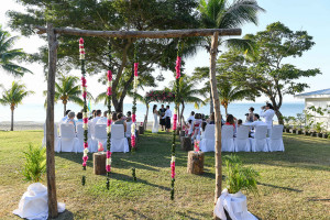 Wideshot of guests and wedding ceremony in Sofitel Fiji wedding