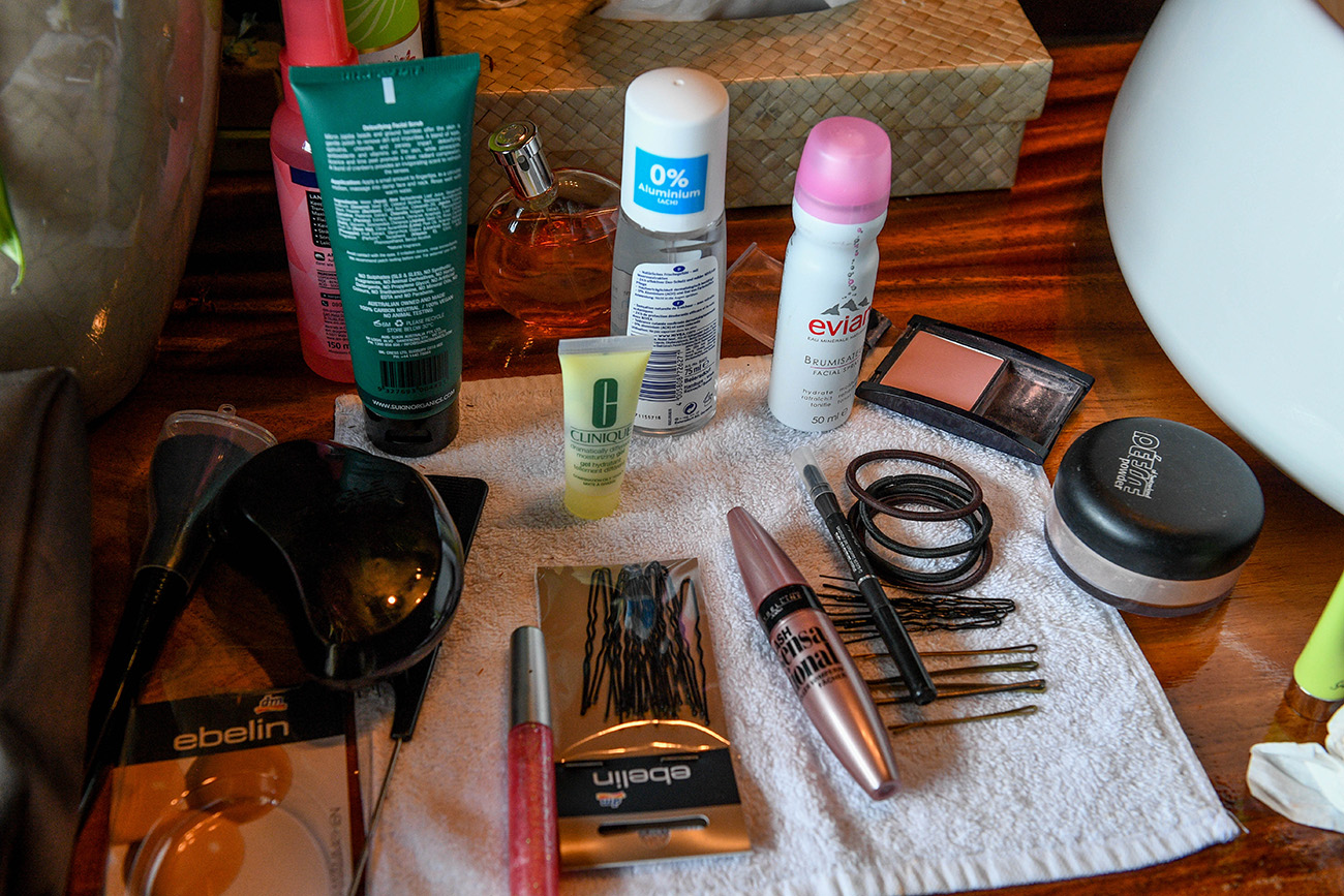 Bride's wedding makeup laid out on the table