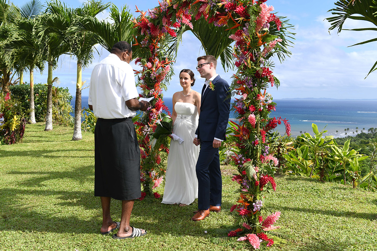 Fiji celebrant officiates the wedding ceremony of German couple in Fiji countryside