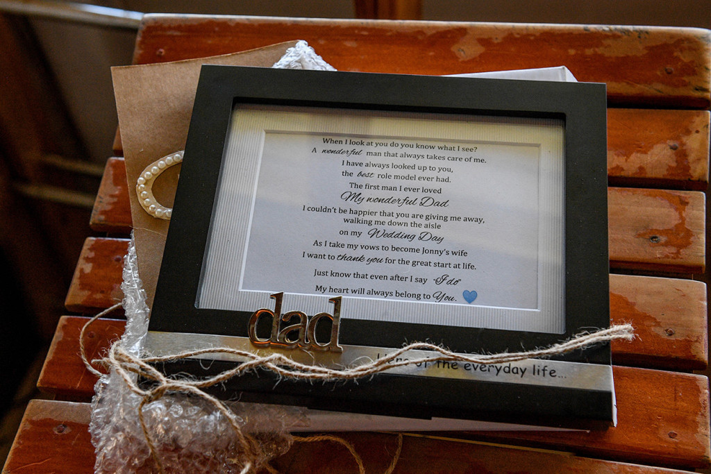 Glass frame of wedding guest list