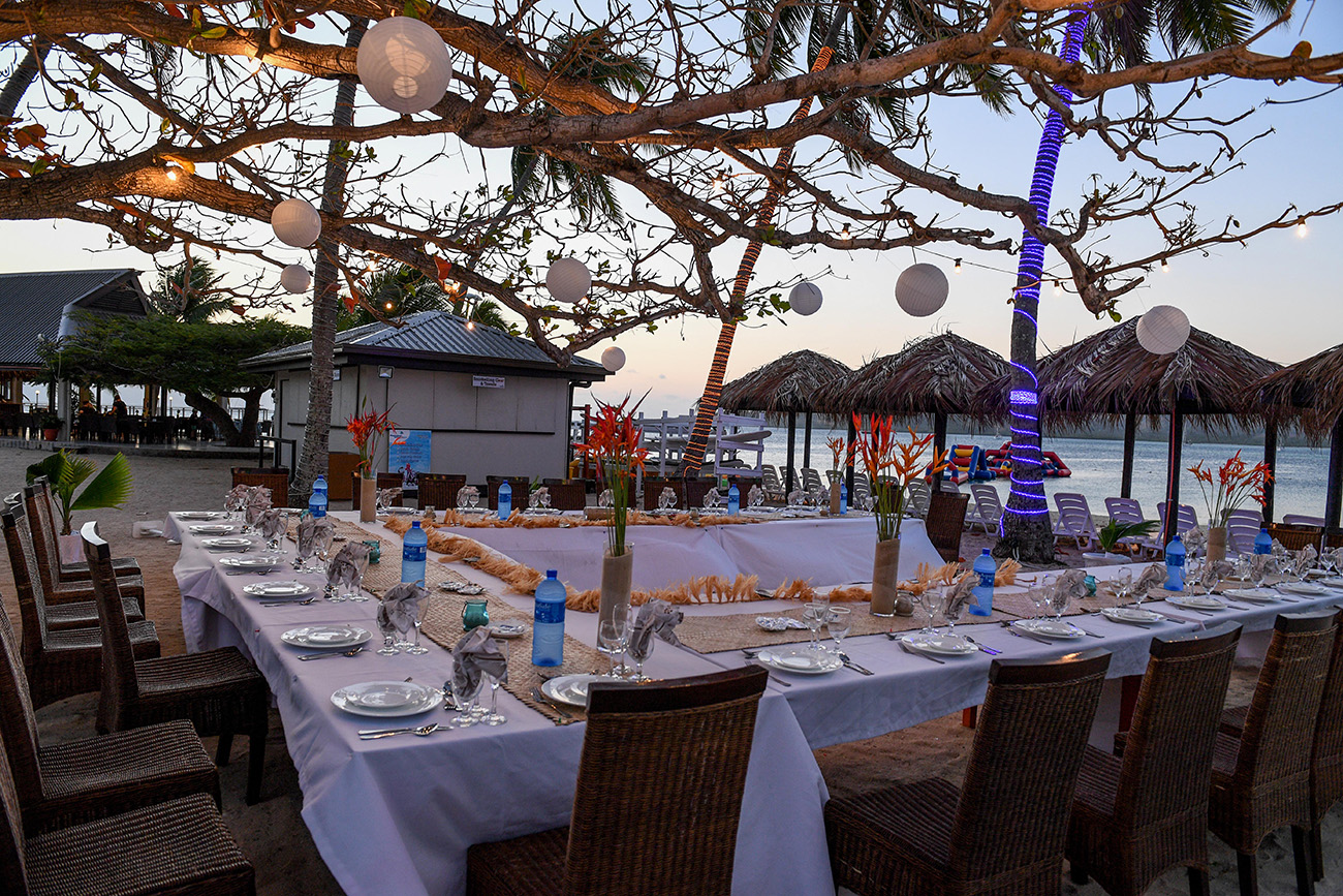 Intricate outdoor wedding reception in tropical Fiji