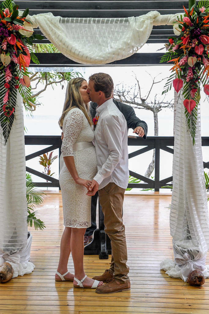 The bride and groom first kiss the elopement ceremony in Fiji