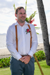 Anxious groom waiting beside the beach for his bride at the Denarau Fiji