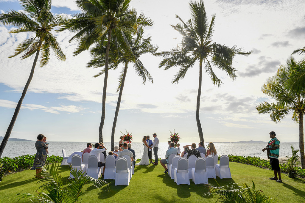 Wideshot of the wedding ceremony overlooking breathtaking Fiji beach at the Sheraton Denarau Fiji