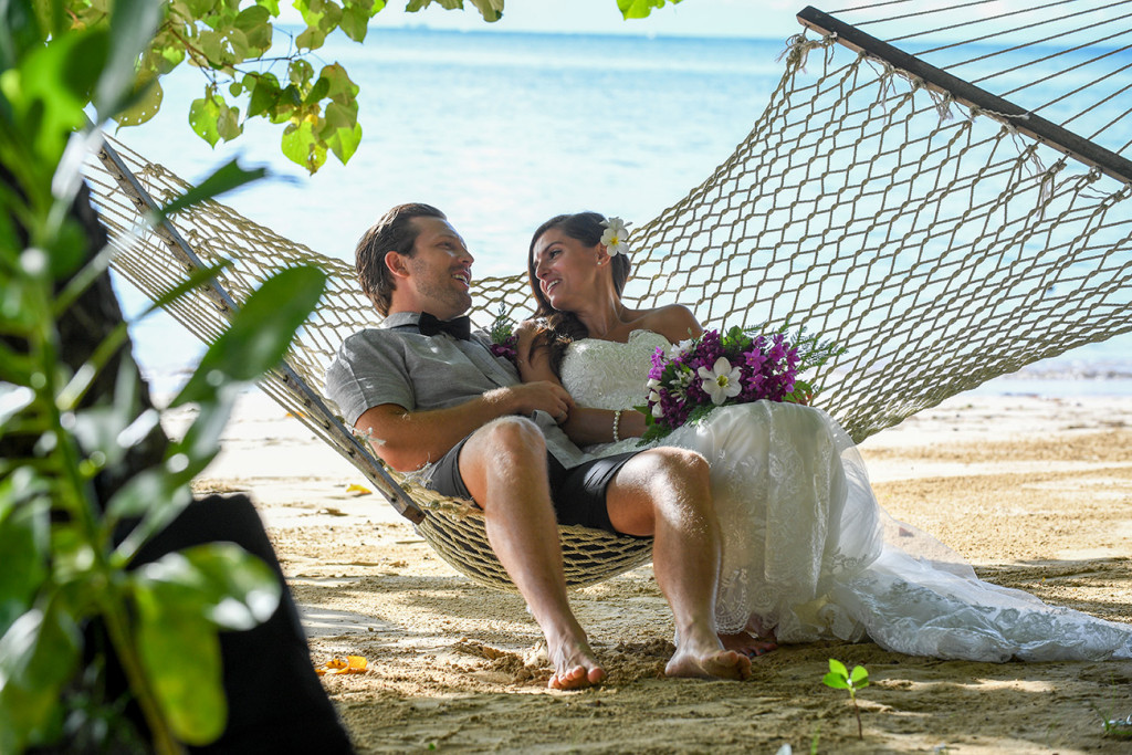 bride and groom chatting in the hammoc, Matangi island resort, Fiji