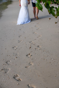 footprint on the white sand of the bride and groom at Matangi island resort in Fiji