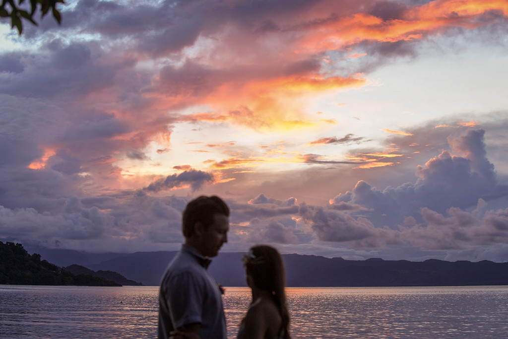 Married couple by the sea Sunset, Matangi Island resort, Fiji