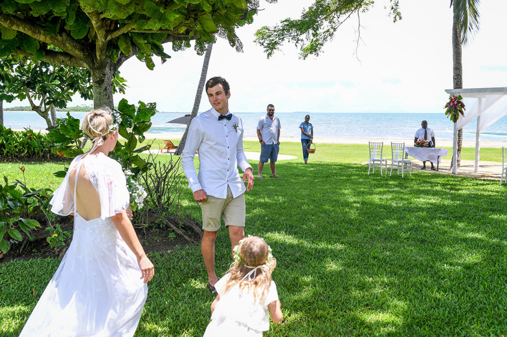 Groom greets his bride and daughter at their wedding in Hilton Denarau Fiji