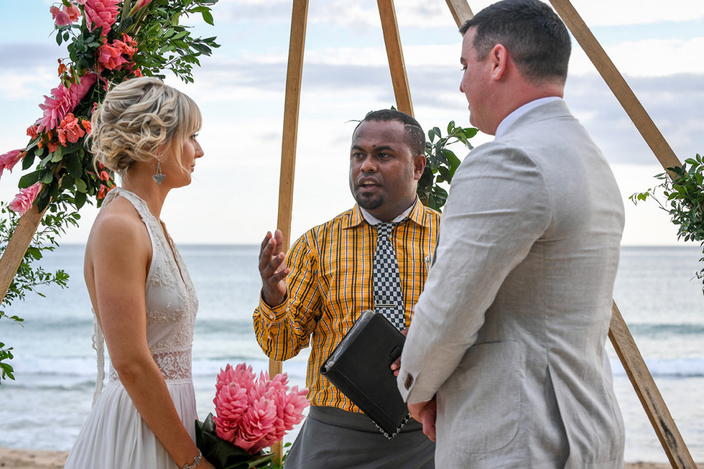 Passionate celebrant marries the eloping couple by the beach