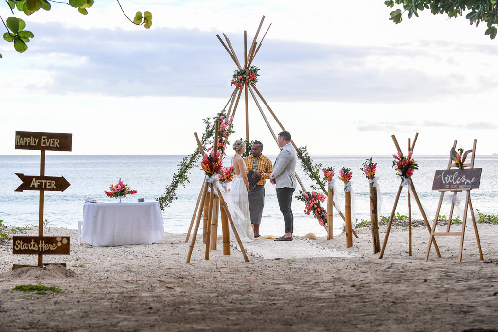 The Wedding teepee decorated by ginger flowers as an altar overlooking the pacific at the Fiji Coral coast