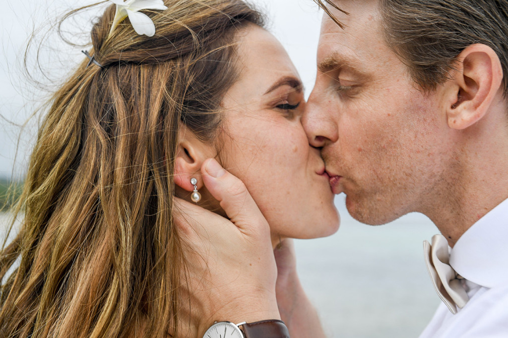 You may now kiss the bride: Passionate kiss of the bride and groom
