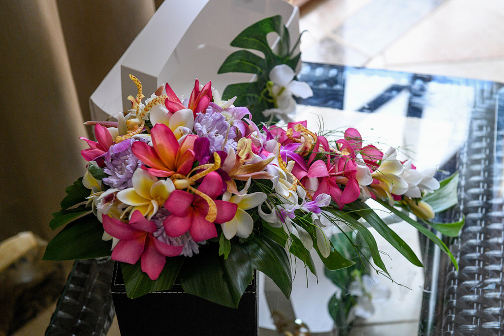 A bouquet made of an assortment of Fiji orchids, frangipani and hibiscus