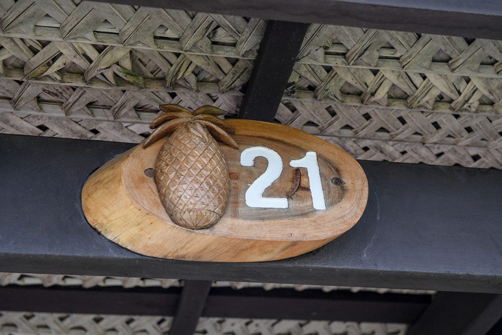 Wooden curved pineapple on Musket Cove room key
