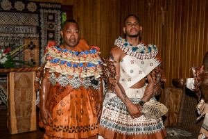 A traditional clad Fiji groom waits with his best man at the altar