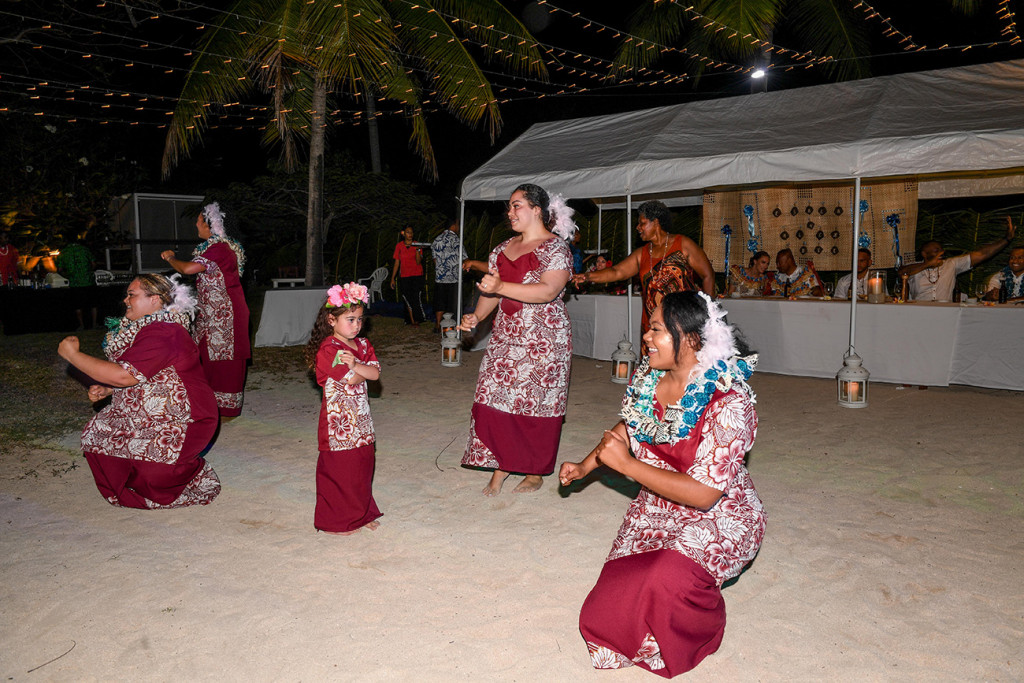 The groom's family present a traditional celebratory Fiji dance in traditional attire