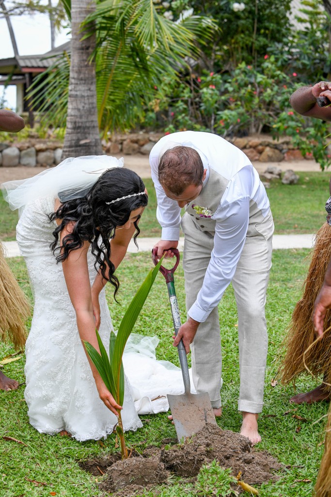 The couple plant a tree to commemorate their union