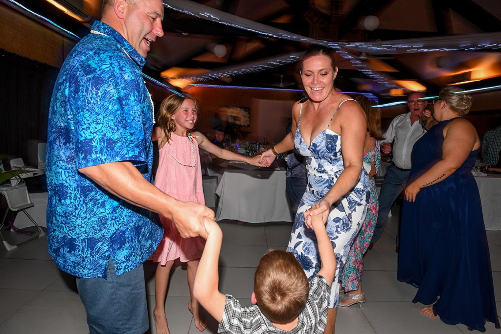A family have a good time dancing at the wedding