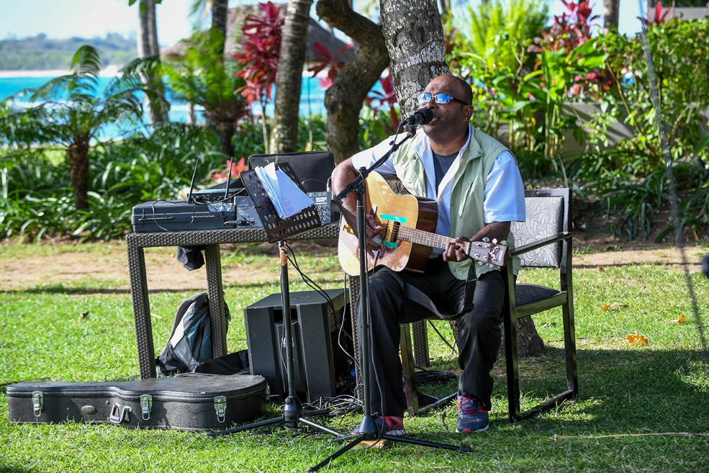 A guitarist from Rue Fiji entertains the guests