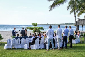 The guests watch the ceremony taking place at the shores of the Intercontinental Fiji