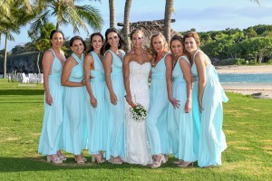 The bride poses with her bridesmaids