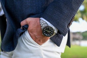 A closeup of the groom's Omega watch