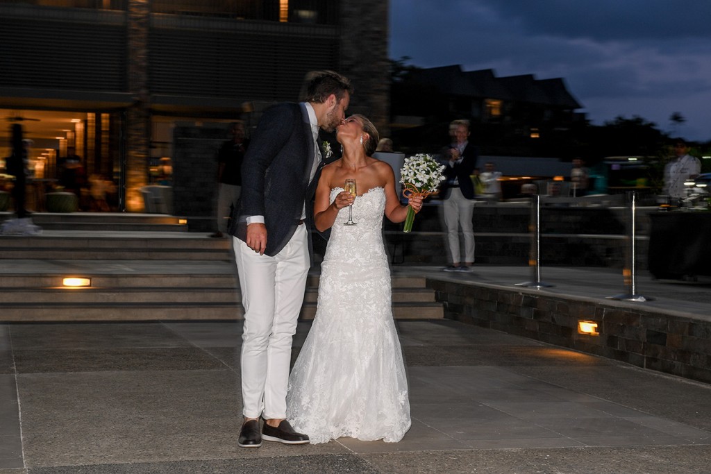 The newly-weds kiss at the Intercontinental Fiji