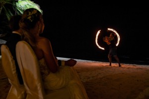 The newly weds enjoy a fire dance by Rue Fiji