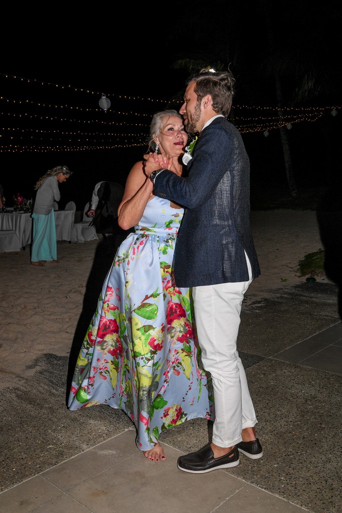 The groom dances with his mother