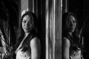 A monochrome picture of the breathtaking bride and her reflection