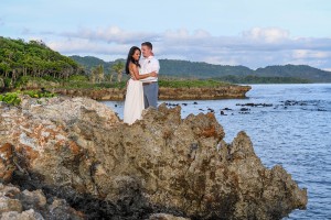 The newly-weds pose on a coral rock at Savasi Fiji