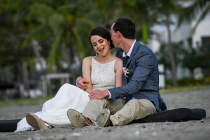 The newly-weds cuddle on the shores of the Pacific Ocean at Denarau Fiji