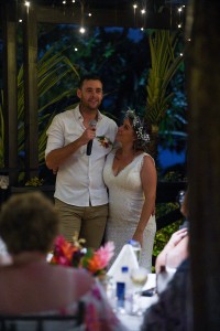 The groom makes a speech with his stunning bride by his side