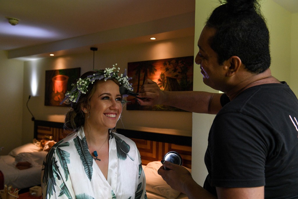 The bride gets her makeup done by Lodo of Totoka makeup