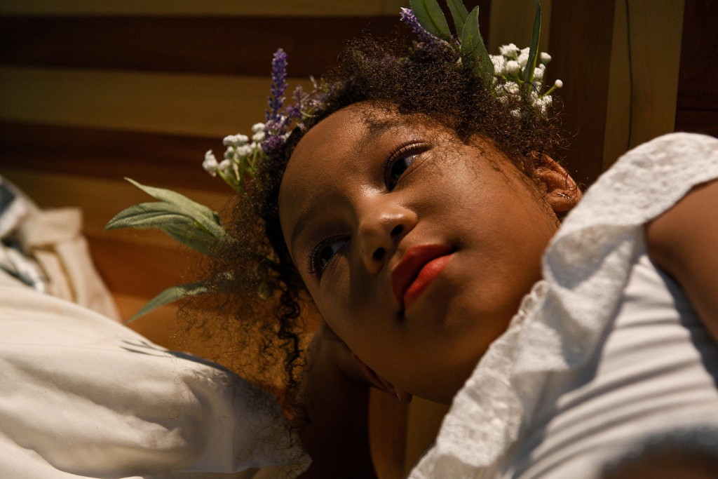 A closeup of the cute Fiji flowergirl wearing a flowergirl