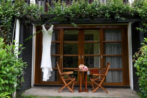 The bride's exquisite wedding gown is hung outside