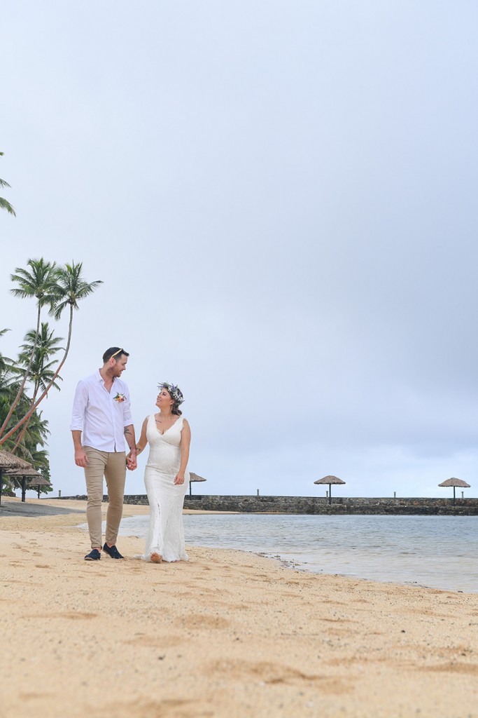 The newly weds stroll on the sandy beaches of Warwick Fiji