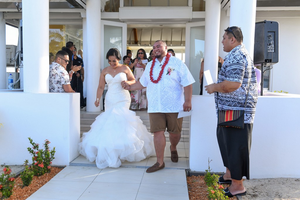 The newly weds celebrate as they file out of the Sheraton Fiji chapel