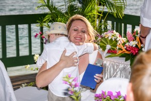 The bride hugs her son after officially married