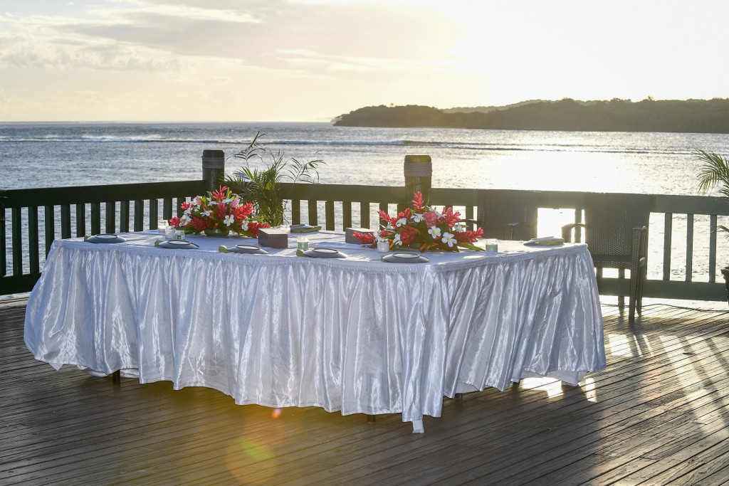 The exquisite wedding dinner set up on the dock overlooking the a