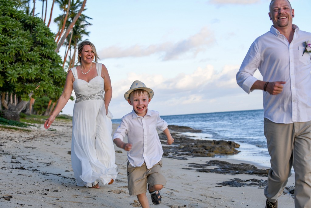 The new happy family run along the beach at Shangri La in Fiji