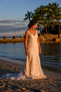 The golden sun glows off the bride at Warwick beach Fiji