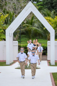 Best boys and the flower girls lead the aisle procession