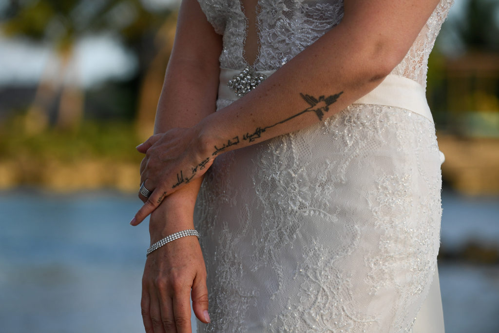 The bride's intricate tattoo on her forearm