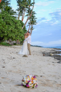 The newly weds share a passionate kiss on Shangri La beach in Fiji